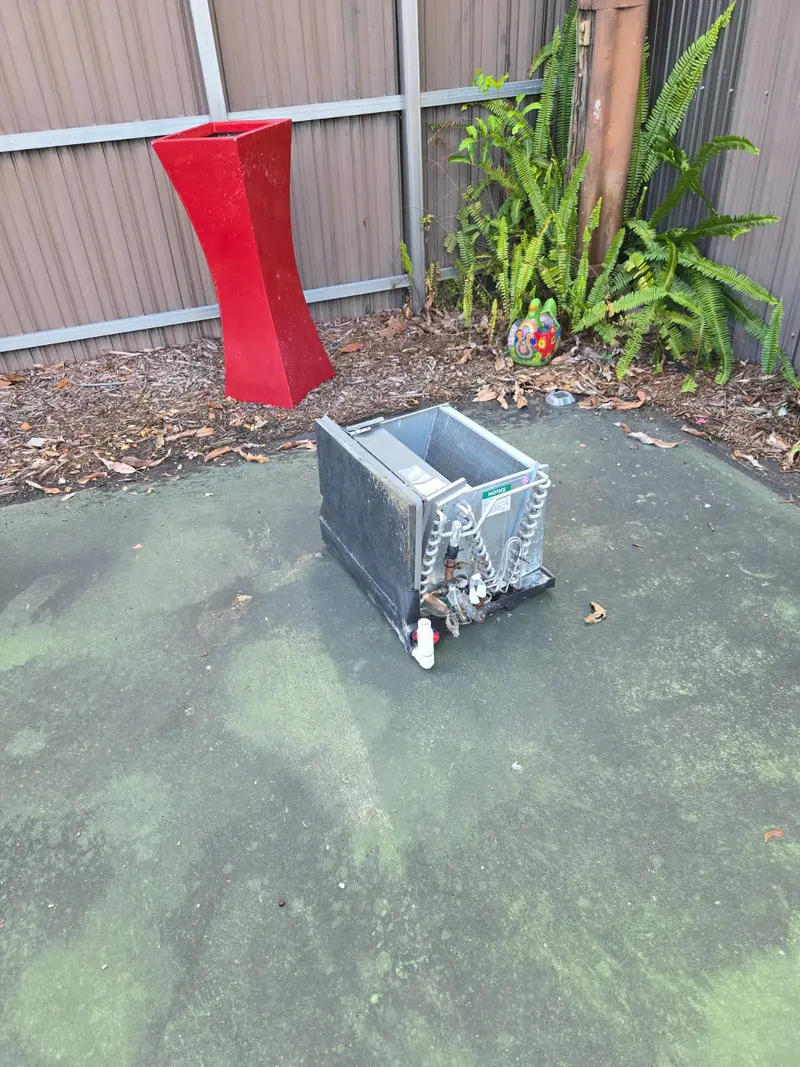 Air conditioning coil removed for deep cleaning service